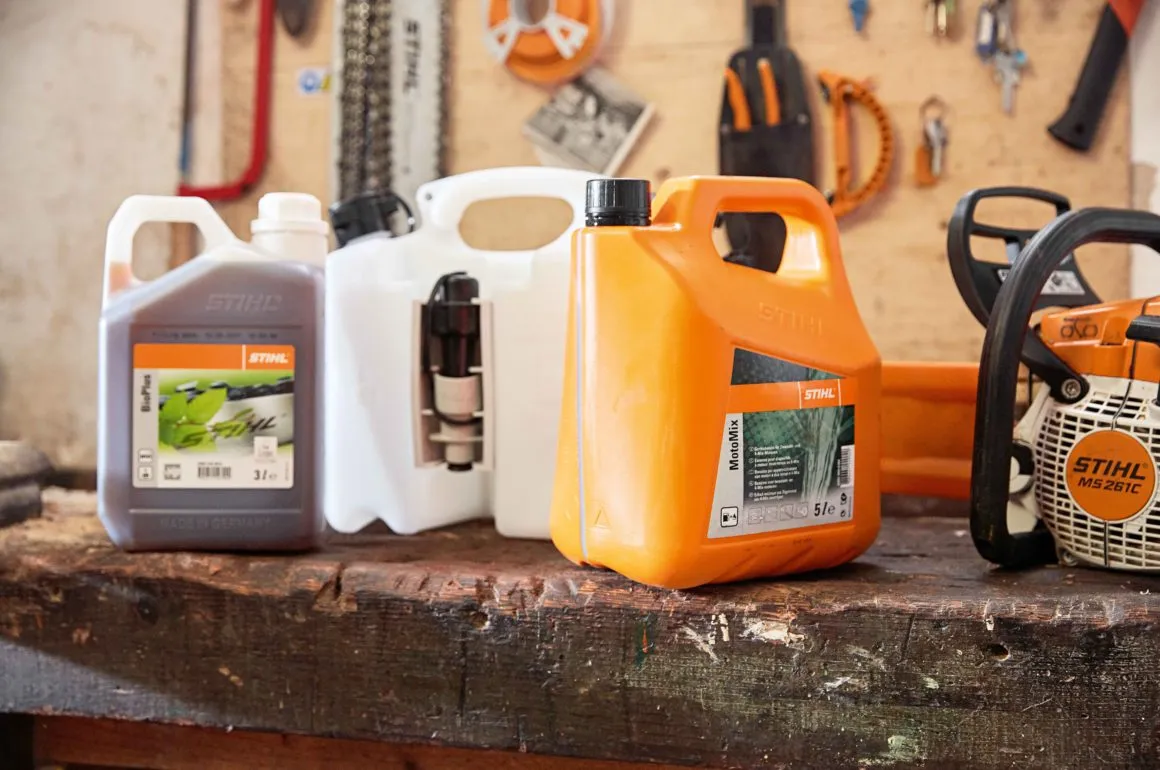 Petrol-powered chainsaw and line trimmer sitting in a frosty shed on a cold NZ winter morning