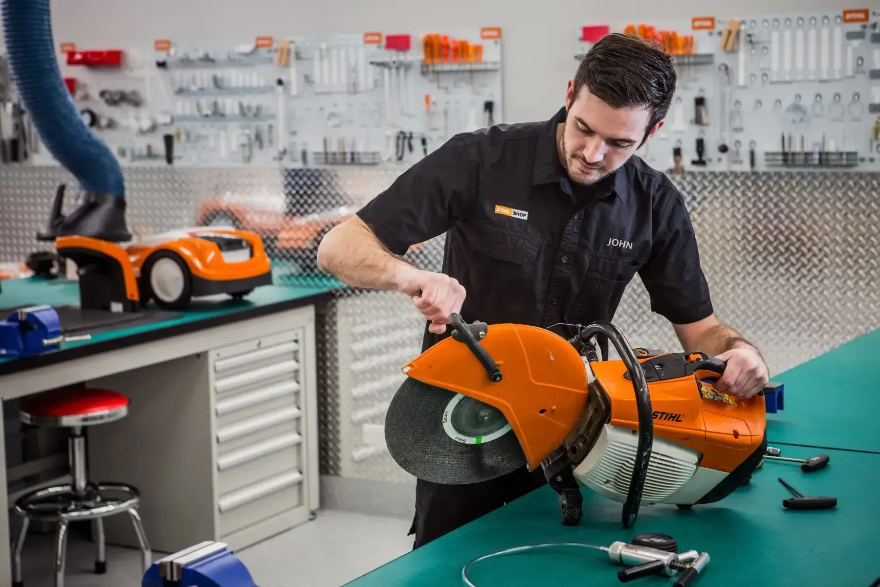 Professional technician servicing equipment alongside DIY maintenance tools